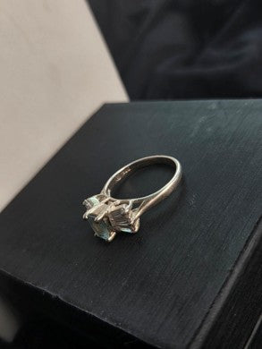 Pale Blue Emerald-Cut Three-Stone Ring