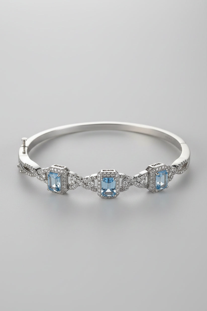 925 sterling silver Bangle hinged Bracelet with Ice blue Topaz like stones