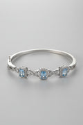 925 sterling silver Bangle hinged Bracelet with Ice blue Topaz like stones