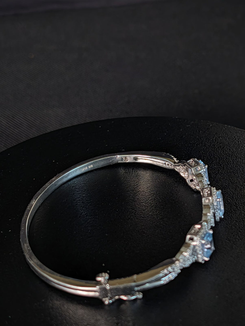 925 sterling silver Bangle hinged Bracelet with Ice blue Topaz like stones
