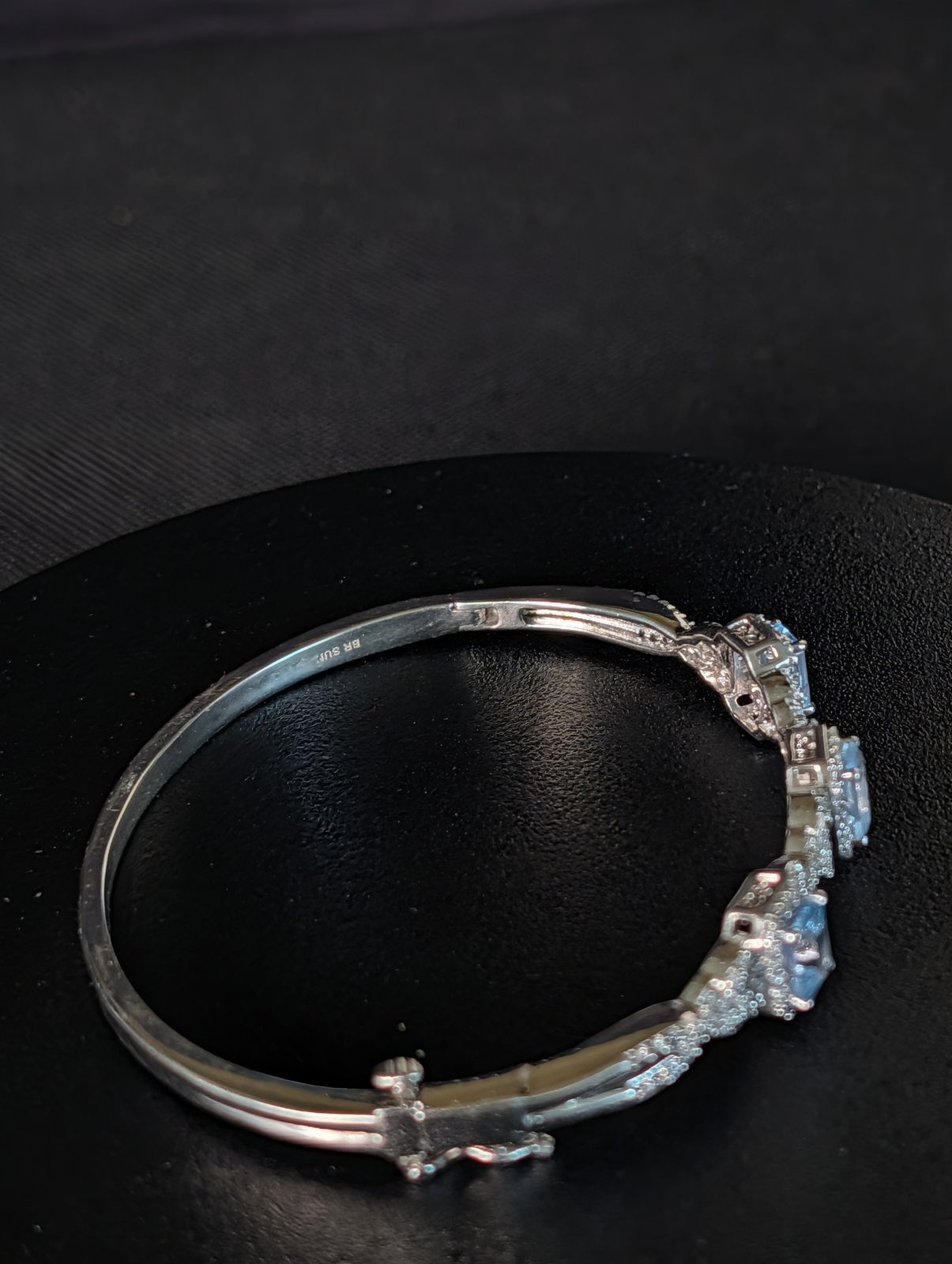 925 sterling silver Bangle hinged Bracelet with Ice blue Topaz like stones