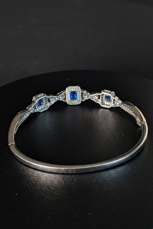 925 sterling silver Bangle hinged Bracelet with Ice blue Topaz like stones